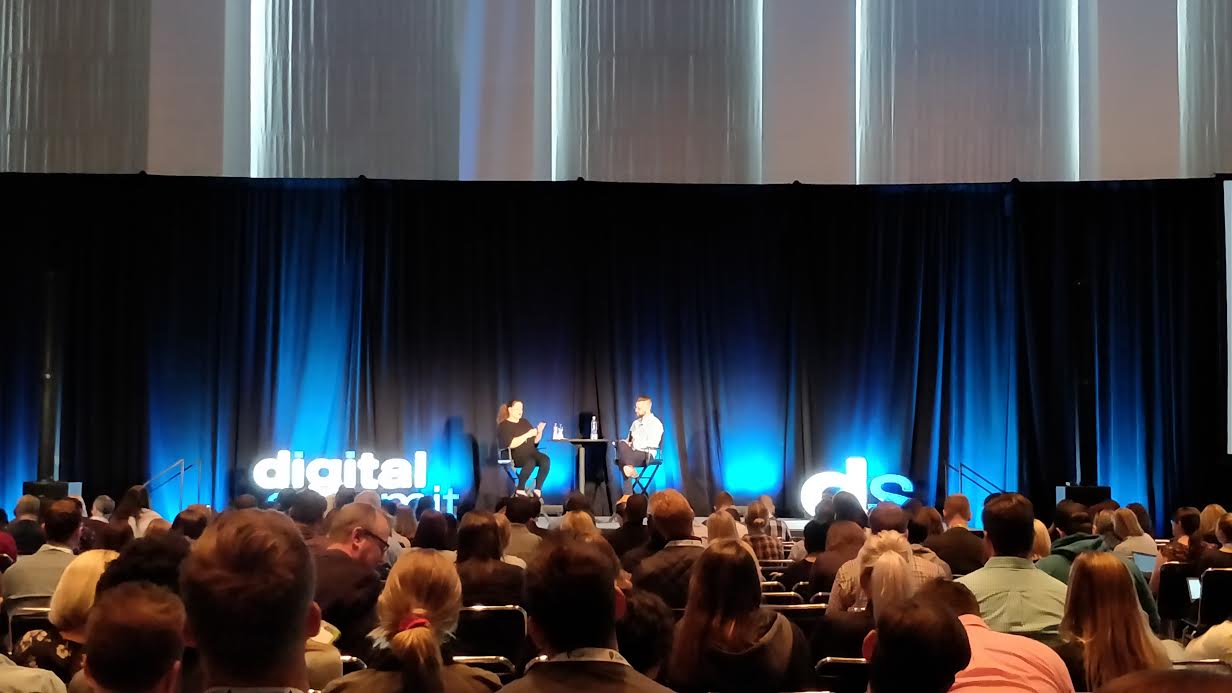 People discussing topics on stage at the Chicago Digital Media Summit 2018