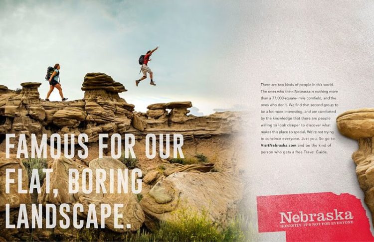 Ad for Nebraska with people jumping along a rock wall 